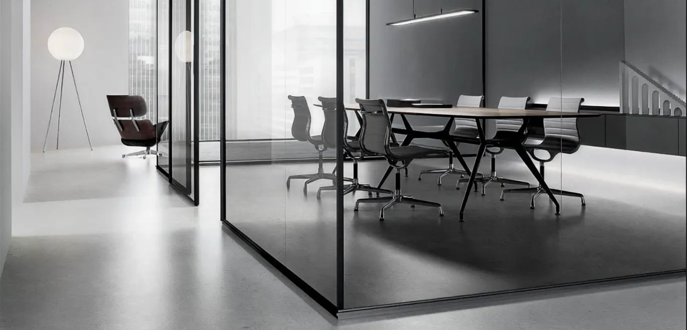 Large conference area featuring minimally framed bulletproof glass walls