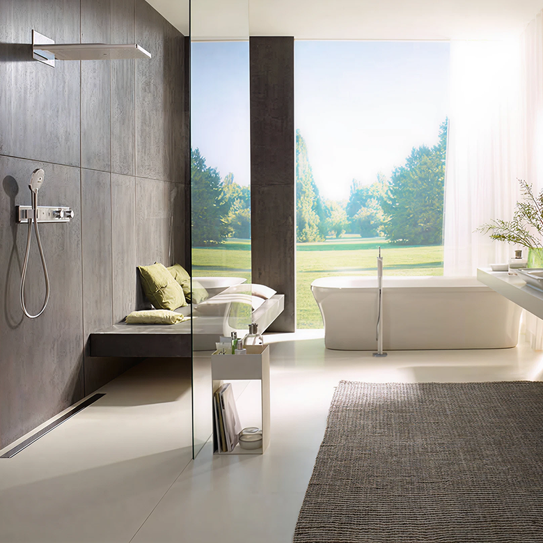 Modern bathroom design by Villeroy & Boch featuring a vanity with washbasins, and a freestanding bathtub