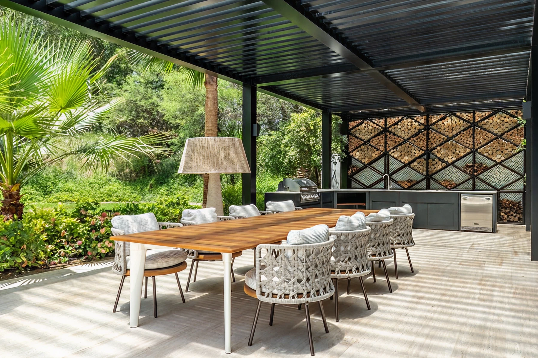Contemporary living room with plush seating, floor-to-ceiling windows, and a striking chandelier