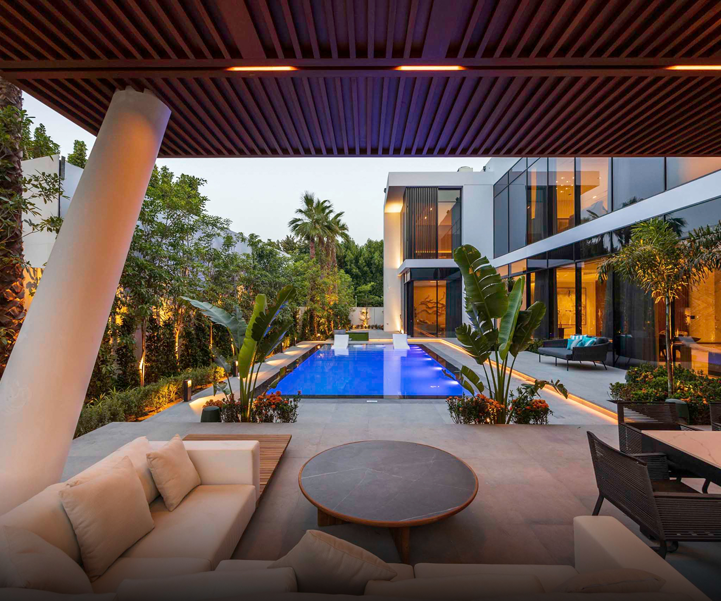 Luxury villa featuring an infinity pool and custom landscaping.