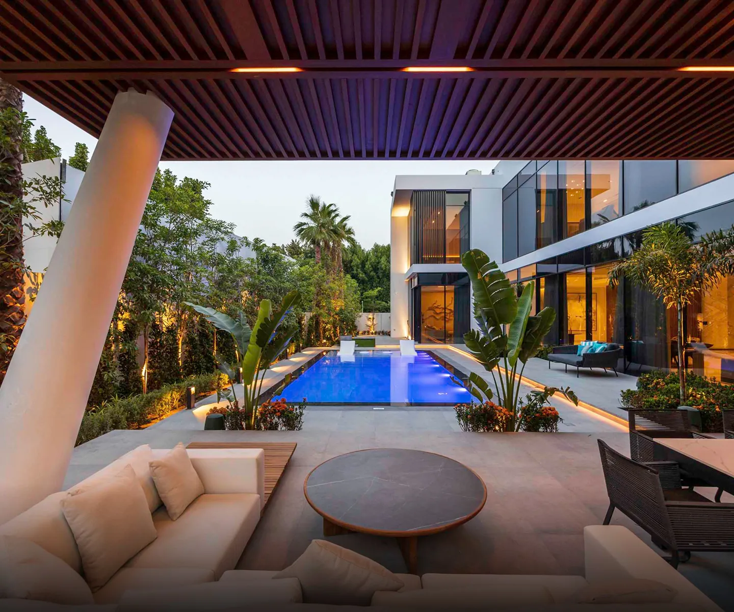 Luxury villa featuring an infinity pool and custom landscaping.