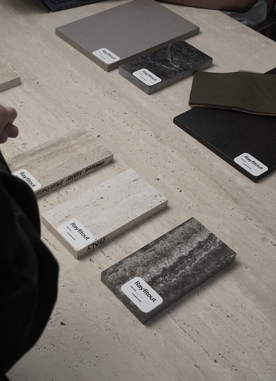 Textured travertine stone showcases natural pores in modern interior design.