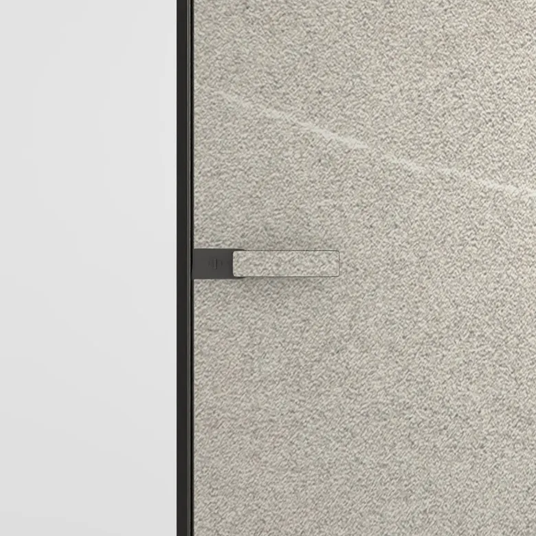 Contemporary room with a hidden ray eclipse wood-finish door, set into a white wall.