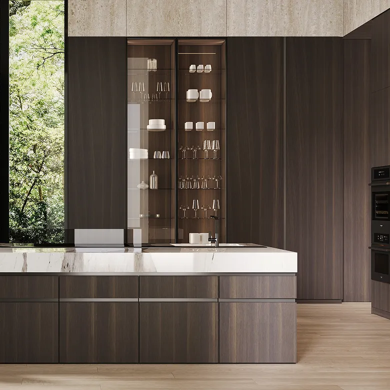 Modern kitchen interior design in Abu Dhabi featuring rich wood cabinetry and bespoke joinery.