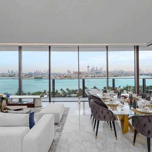 Luxury bedroom interior design featuring floor-to-ceiling windows by Rayfitout.