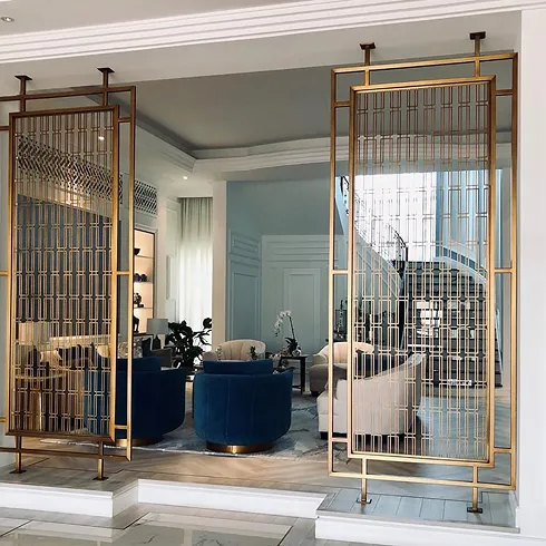 Luxury bathroom interior design with marble accents, a bathtub, and modern sinks.