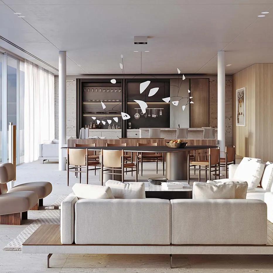 Modern open-plan living and dining space interior with modular sofas by Rayfitout in Dubai.