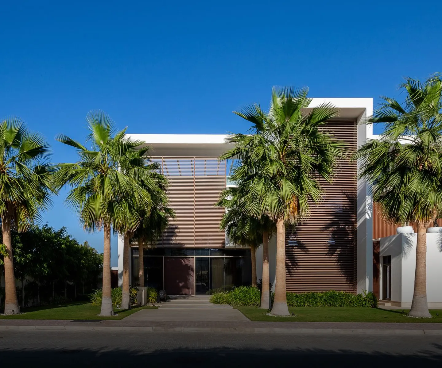 Modern interior design in Dubai featuring floor-to-ceiling windows.