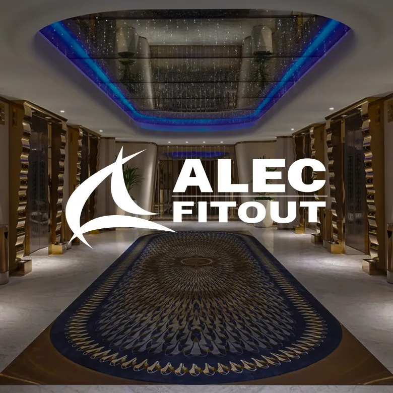 Modern luxury corridor with gold paneling and potted plants crafted by a top interior fit out company in Dubai.