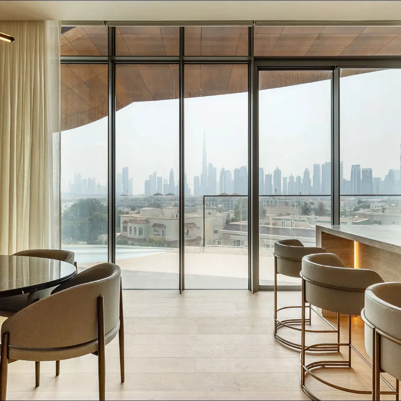 Penthouse Interior Design featuring floor-to-ceiling windows.