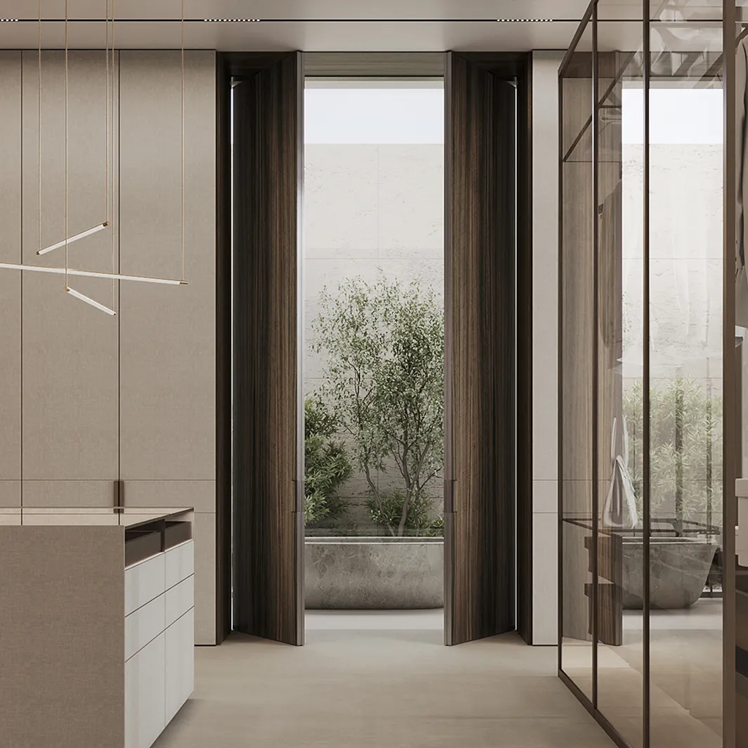 Luxury villa hallway with wood doors, a kitchen island, and a glass-walled bathroom.