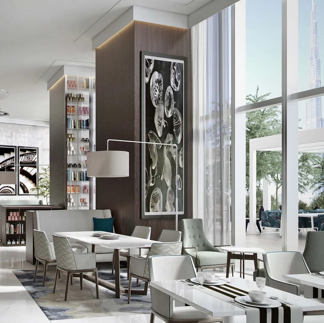 Luxury dining interior featuring modern seating and curated displays in Dubai.