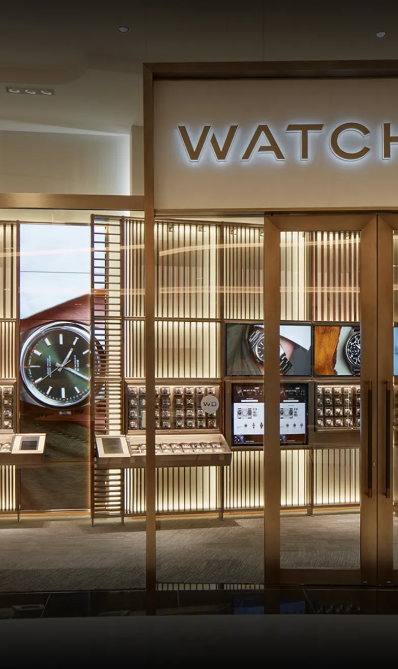 Commercial Interior Design of WatchBox store with illuminated luxury displays in Dubai.