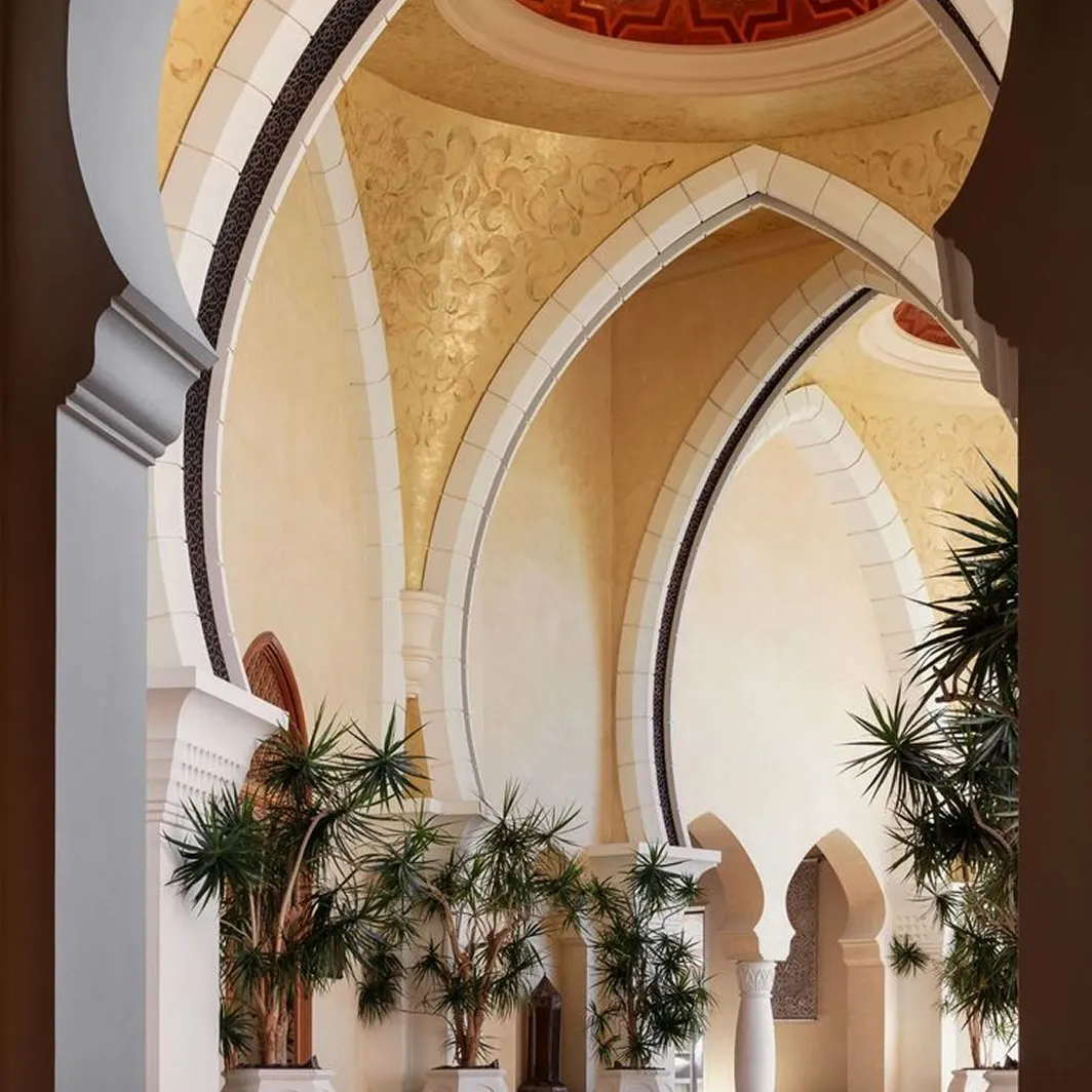 Hospitality interior design reflecting gilded arches at One&Only Royal Mirage Dubai.
