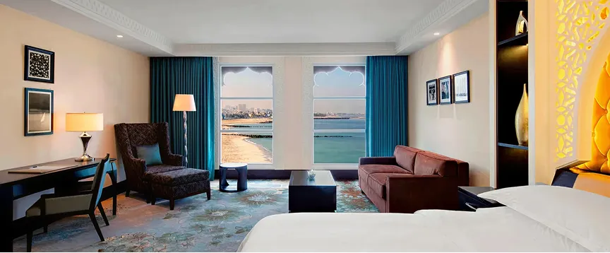 Modern hospitality interior design with contemporary furnishings and beach views.