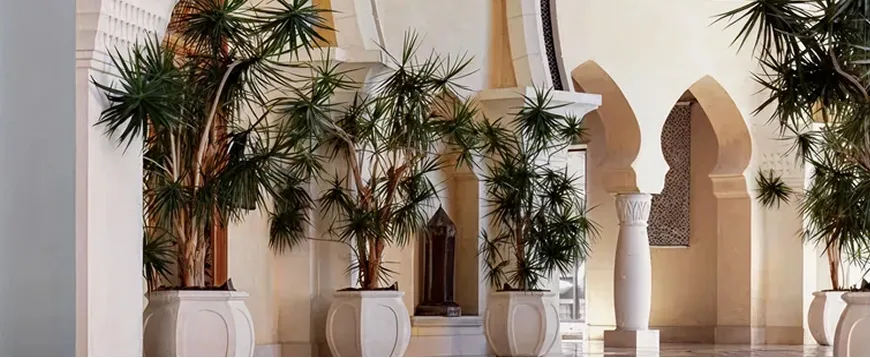 Contemporary hospitality interior design in Dubai featuring Arabian architectural details.