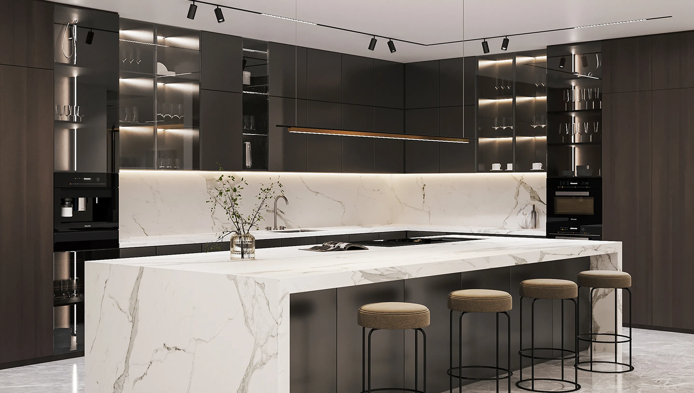 Kitchen interior design featuring marble island, bar seating, and modern cabinetry.