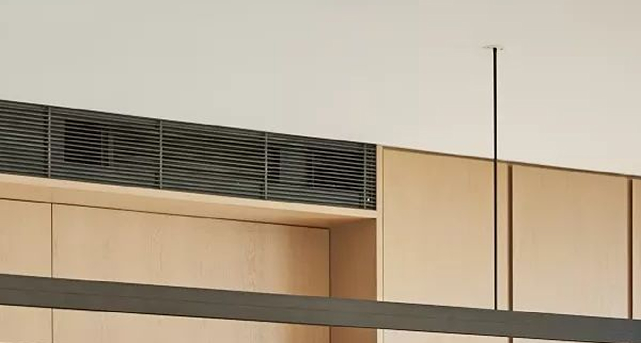 High-end residential interior design of a Palm Jumeirah villa living room with floor-to-ceiling windows.