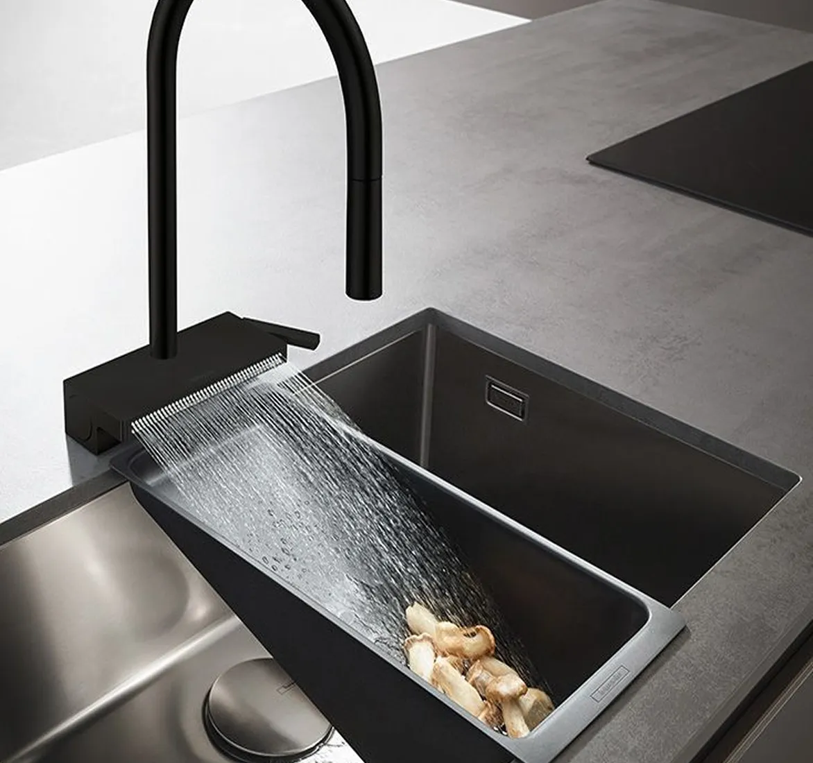 Kitchen design with contemporary faucet, dual-basin sink, and quality finishes by Rayfitout.