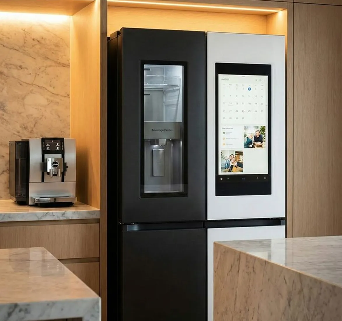 Luxury kitchen design featuring smart refrigerator with touchscreen and integrated cabinetry.