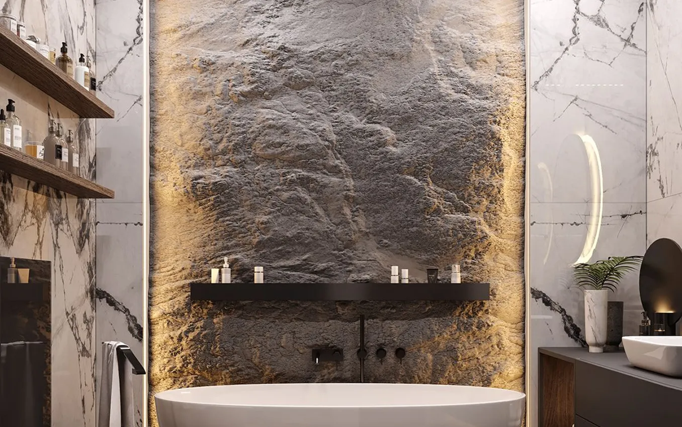 Luxury bathroom interior design featuring a freestanding tub and natural stone wall.