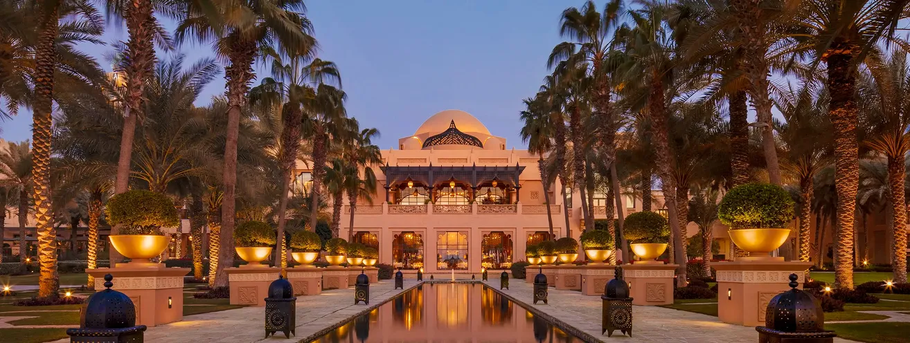 Luxury villa featuring an infinity pool and custom landscaping.