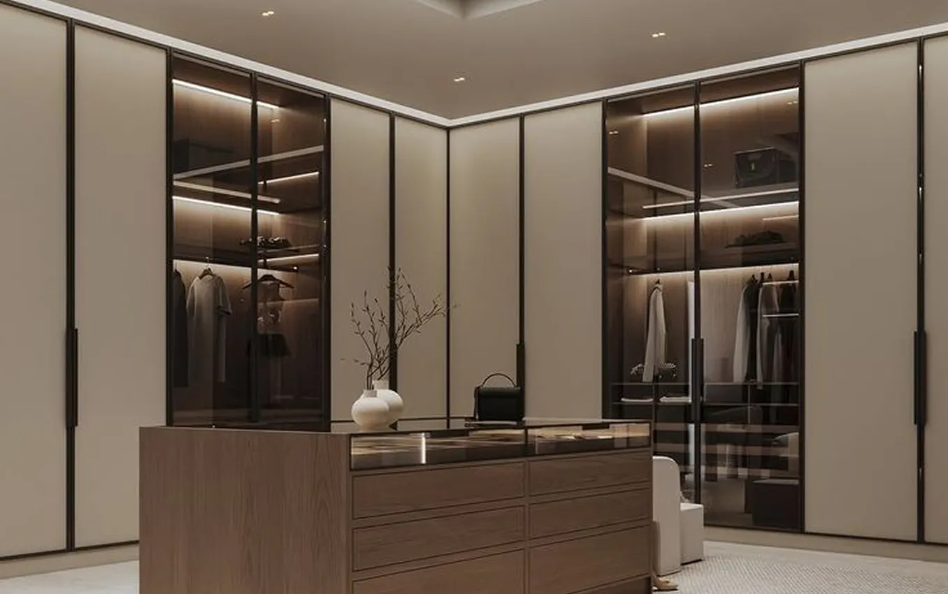 L- shaped walk-in closet design featuring bespoke joinery by Rayfitout.