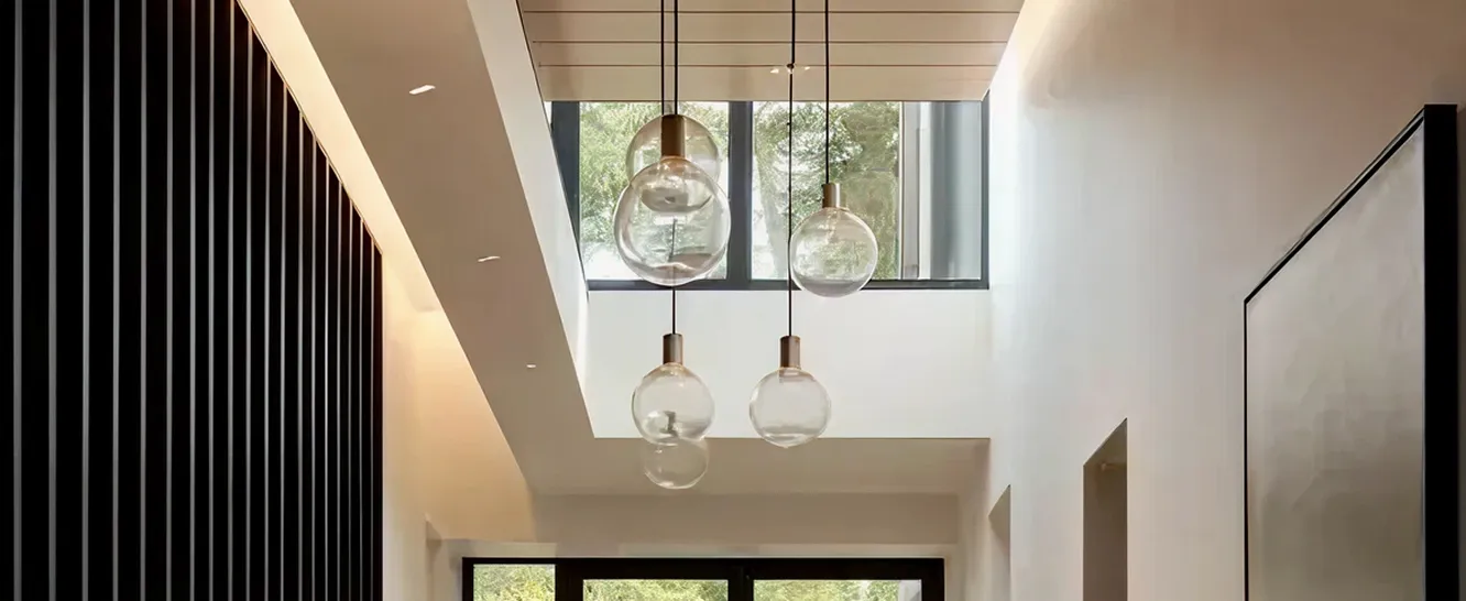 Modern hallway interior featuring expansive windows in a luxury villa in Dubai.