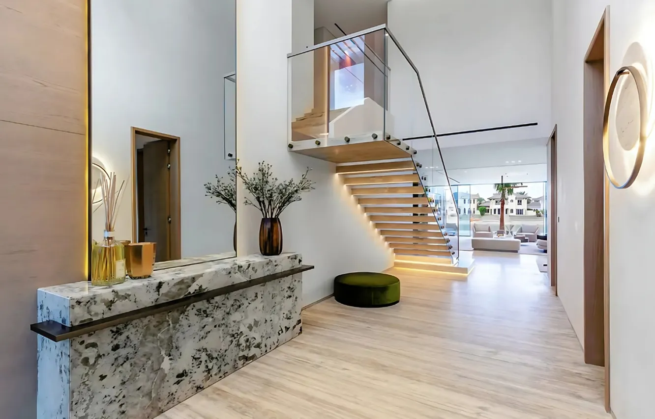 Luxury living room interior design featuring marble floors in Dubai.