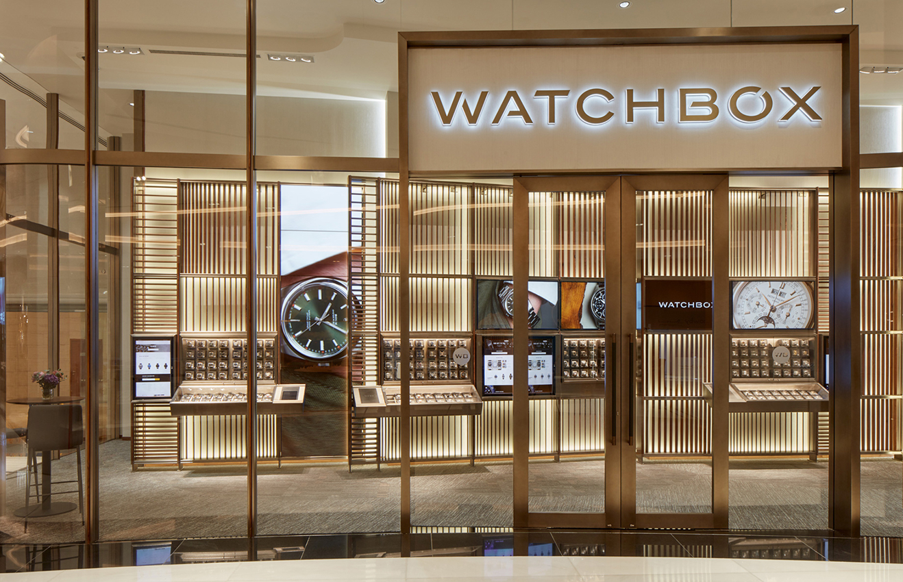 High-end residential interior design of a Palm Jumeirah villa living room with floor-to-ceiling windows.