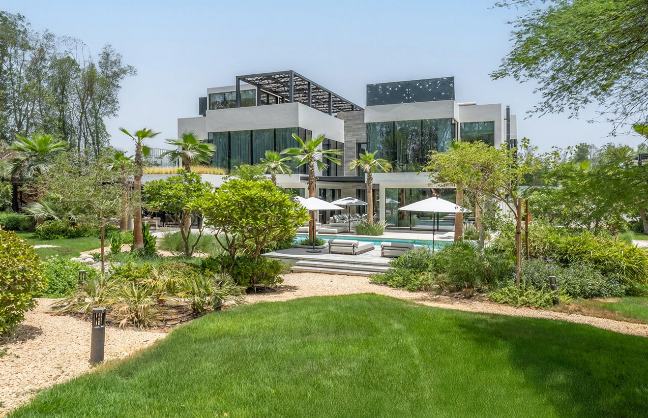 High-end residential interior design of a Palm Jumeirah villa living room with floor-to-ceiling windows.