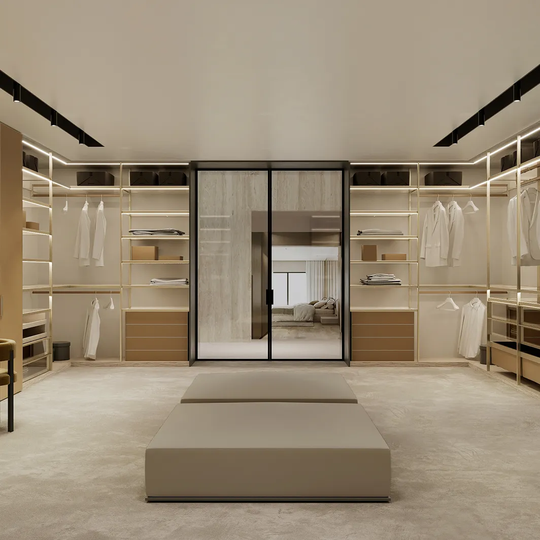 Modern dressing room interior in Abu Dhabi featuring open storage and upholstered center ottoman.