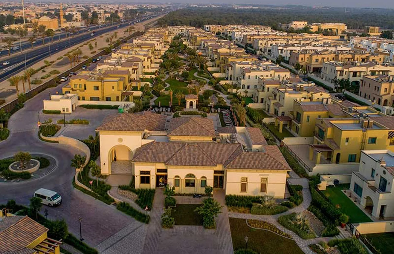 Gated villa communities in Abu Dhabi featuring open-plan interiors by Rayfitout.