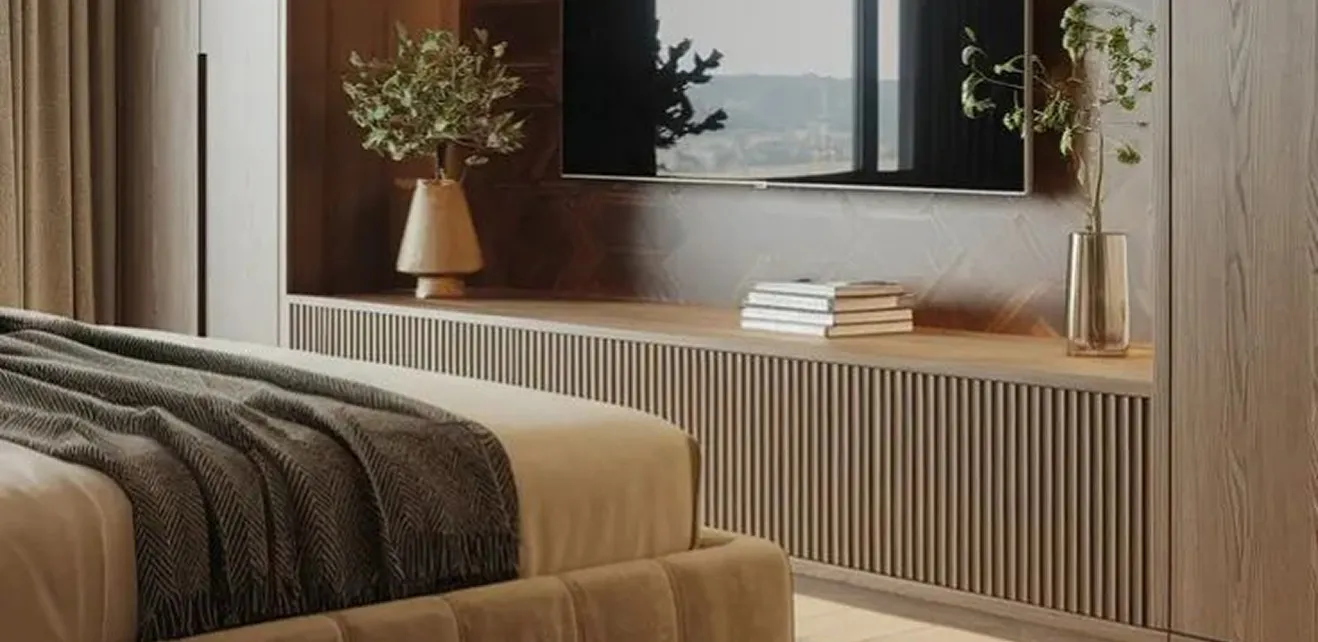 Contemporary living room interior design featuring wall-mounted TV and wooden media unit.