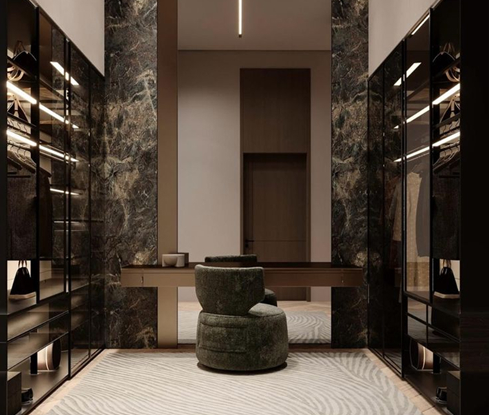 Luxury bedroom interior featuring modular seating and expansive windows in Dubai.