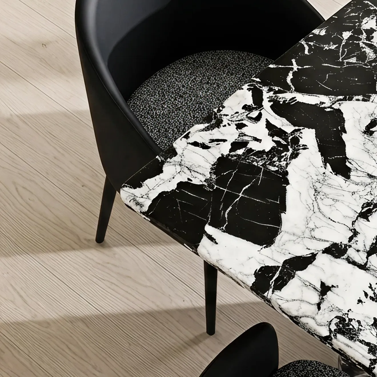 Modern kitchen island featuring a granite countertop and wooden cabinetry.