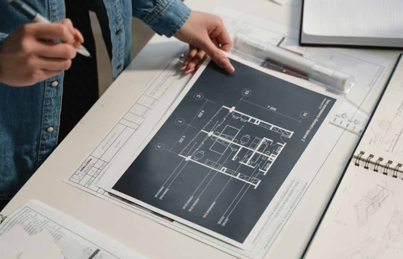 Minimalist living room interior design with floor-to-ceiling windows.