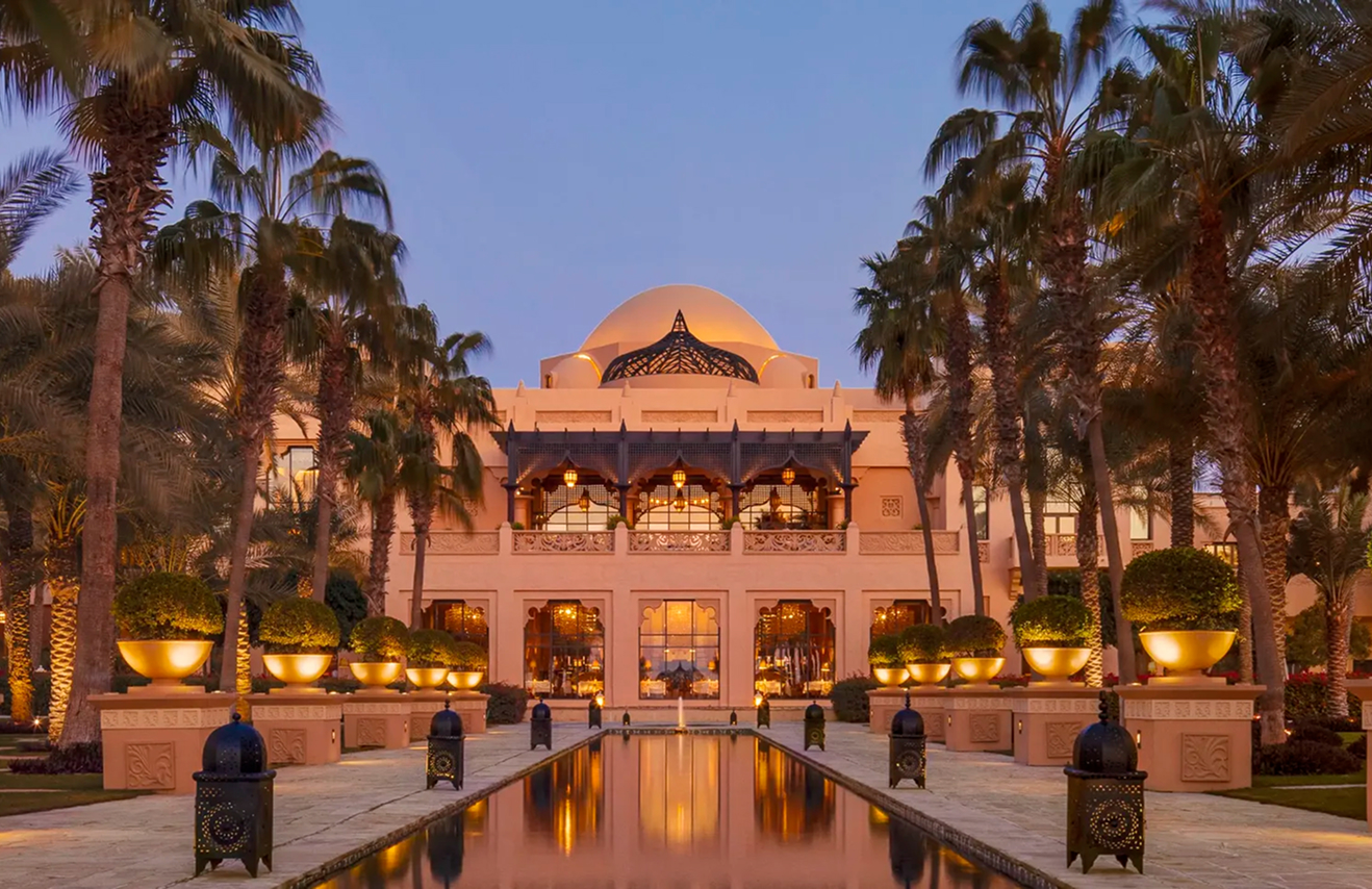 Modern living room interior featuring built-in bookshelf and bespoke joinery in Abu Dhabi.