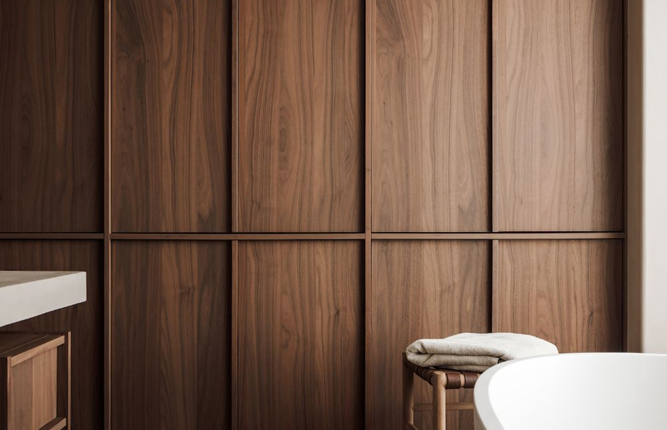 Minimalist living room interior design with floor-to-ceiling windows.