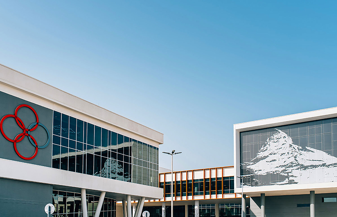 Minimalist living room interior design with floor-to-ceiling windows.