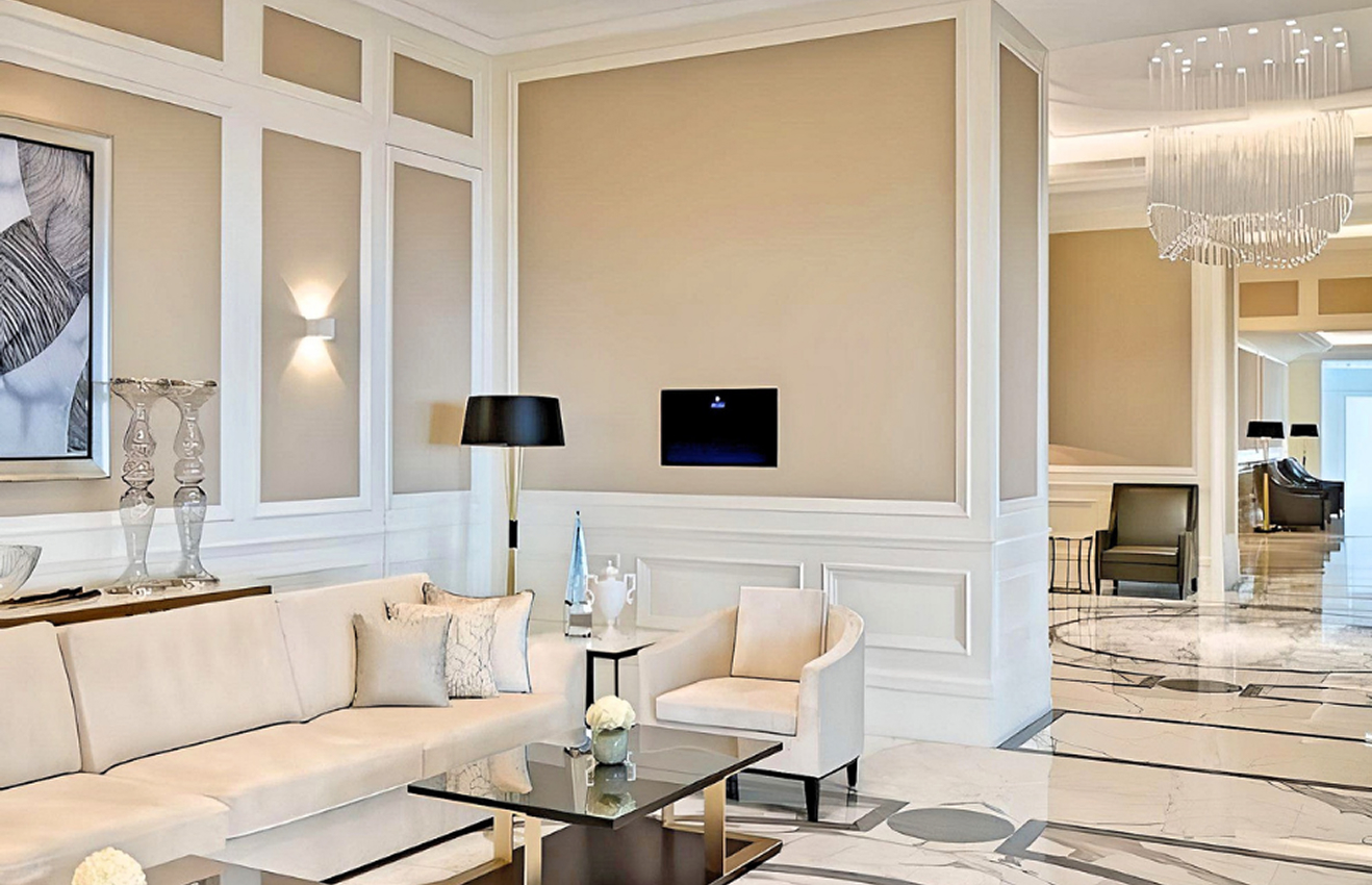 Minimalist living room interior design with floor-to-ceiling windows.