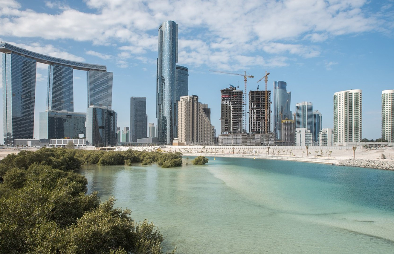 Minimalist living room interior design with floor-to-ceiling windows.