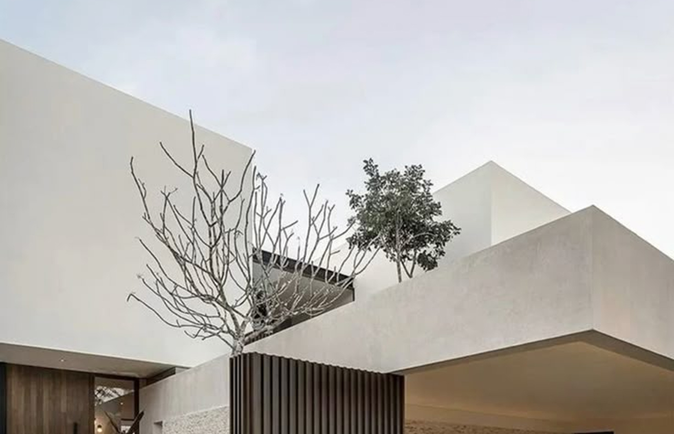 Minimalist living room interior design with floor-to-ceiling windows.