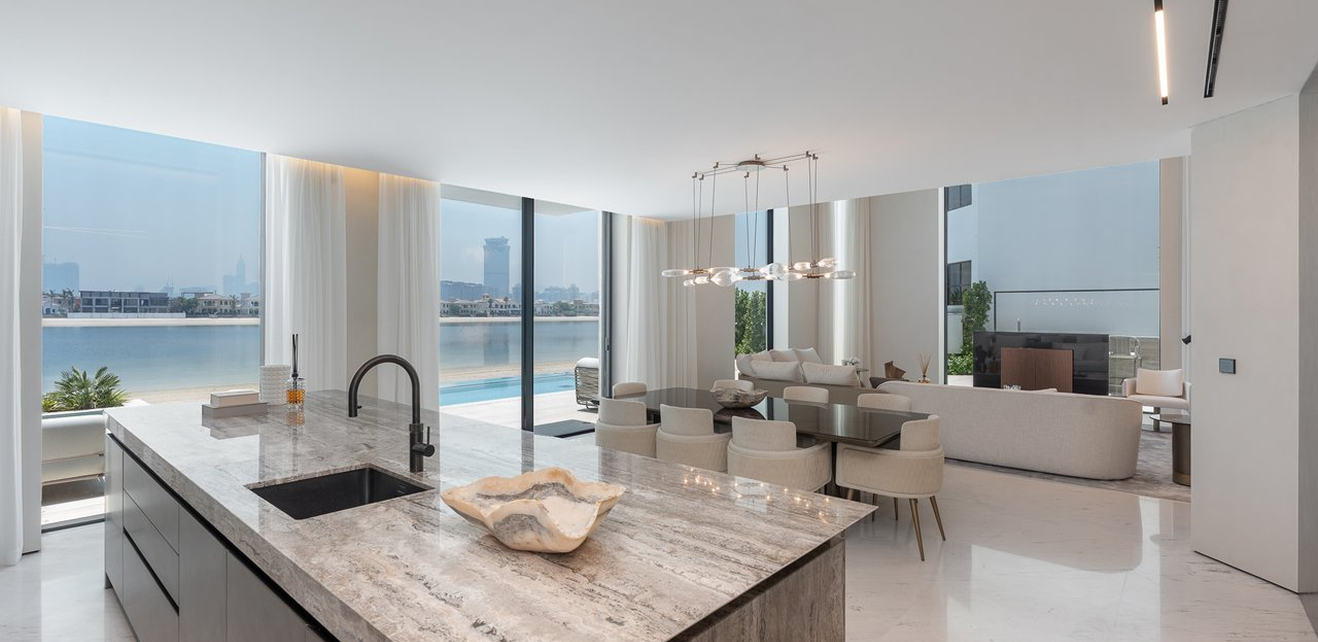 Minimalist living room interior design with floor-to-ceiling windows.
