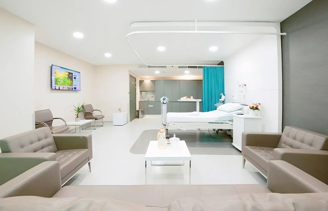 Minimalist living room interior design with floor-to-ceiling windows.