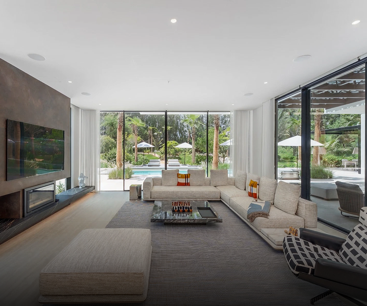 Modern interior design in Dubai featuring floor-to-ceiling windows.