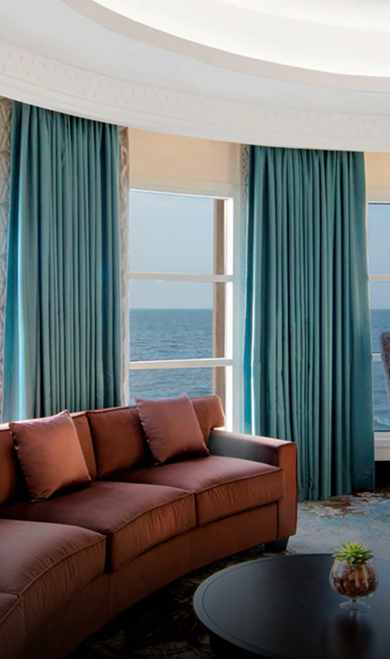 Modern interior design featuring custom ceiling design and bespoke joinery by Rayfitout at the Sheraton Hotel, Dubai.