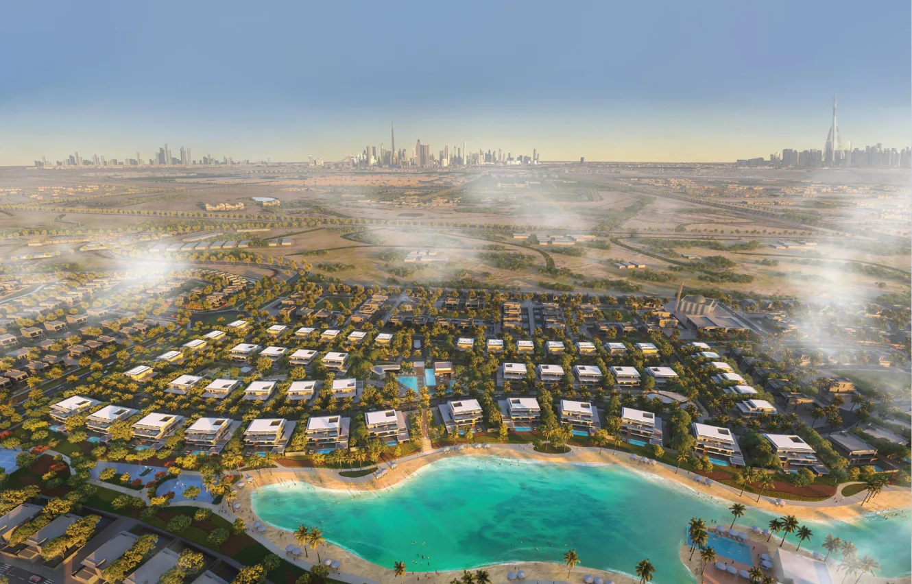 Aerial view of a Dubai villa community with lagoon and skyline