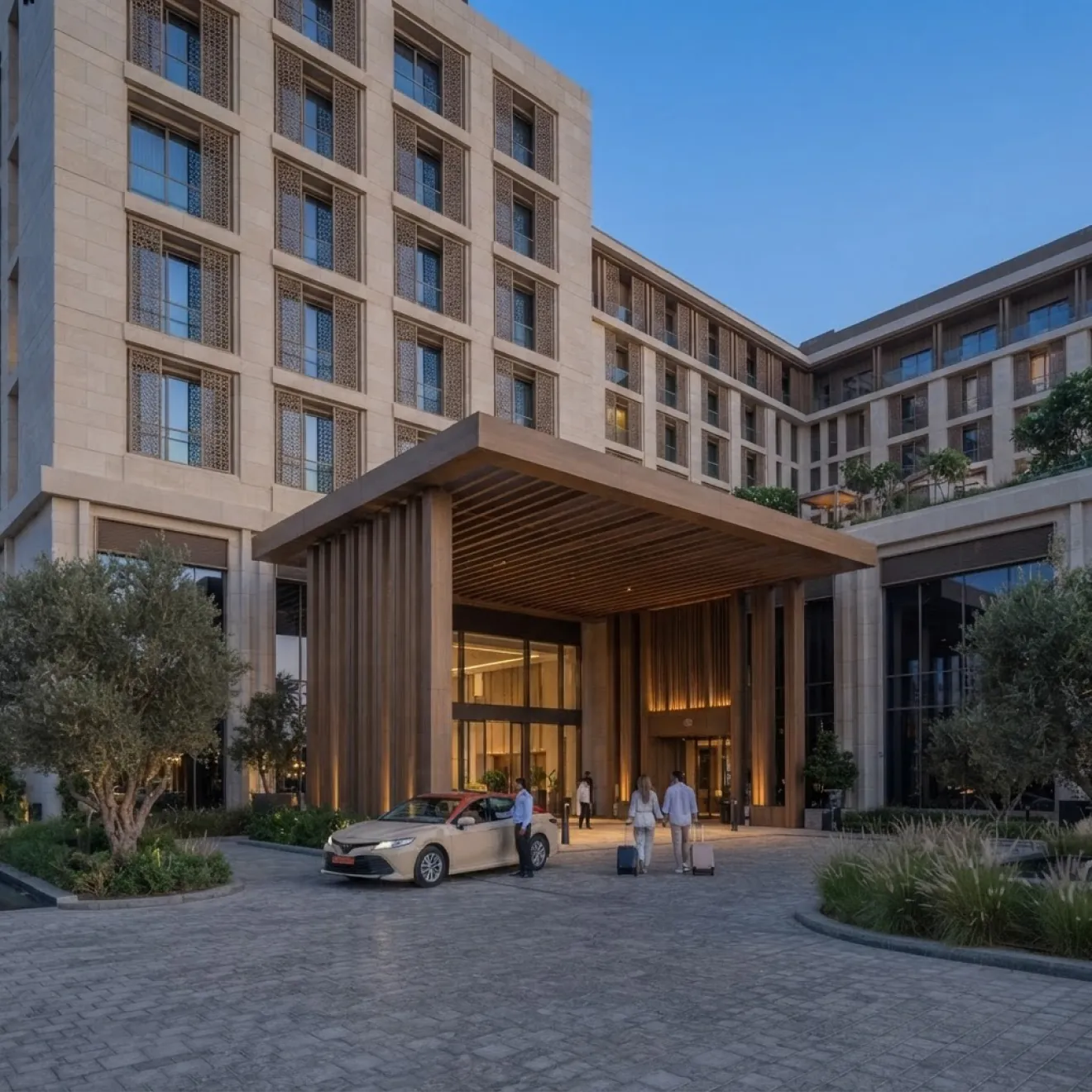 Hotel entrance with timber canopy and landscaped drop-off