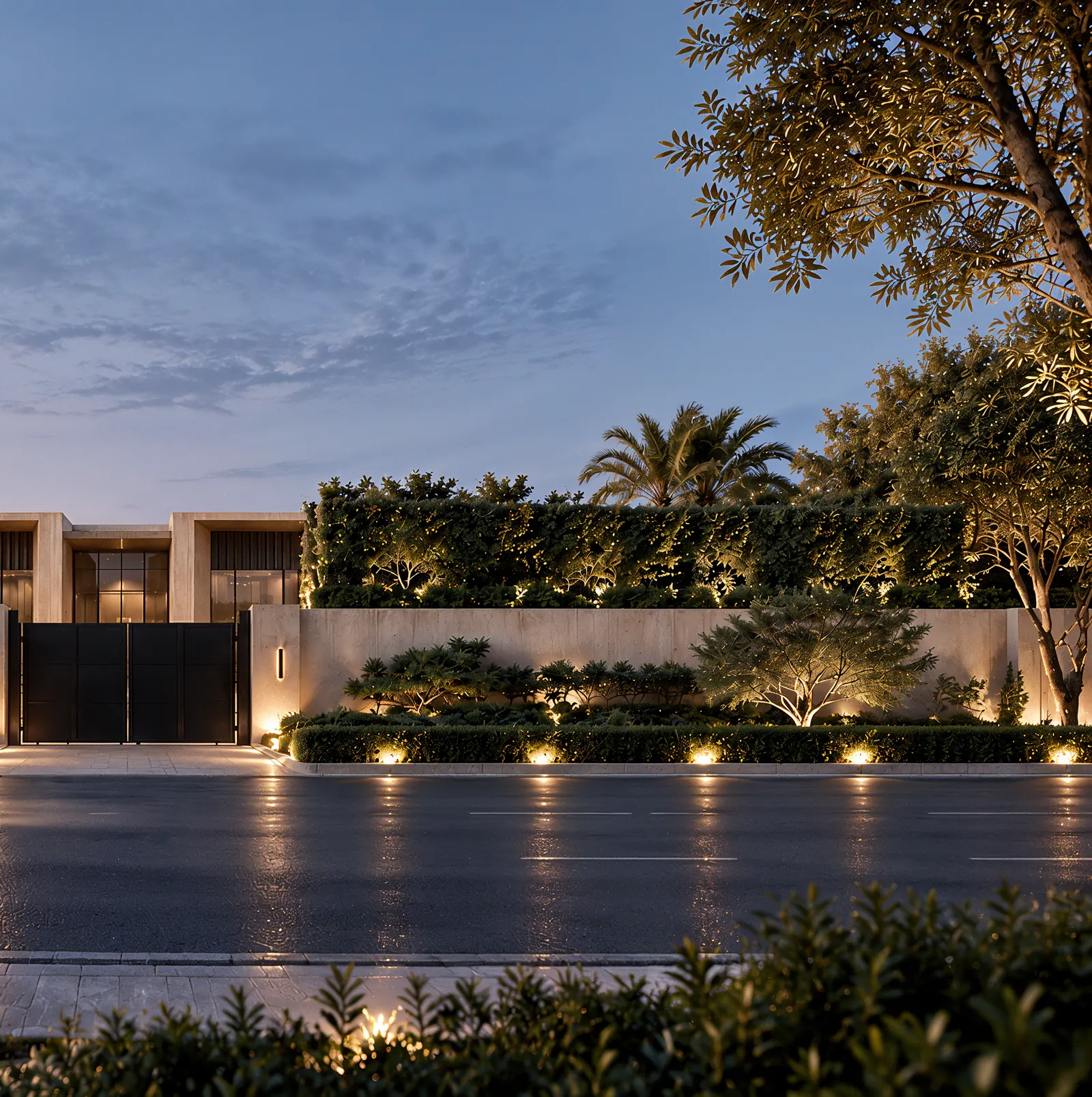 Landscaped luxury villa entrance at dusk illustrating turnkey interior design delivery in Ivory Coast